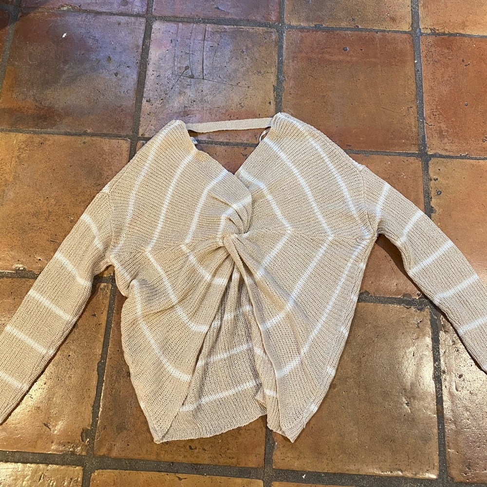 beige and white sweater